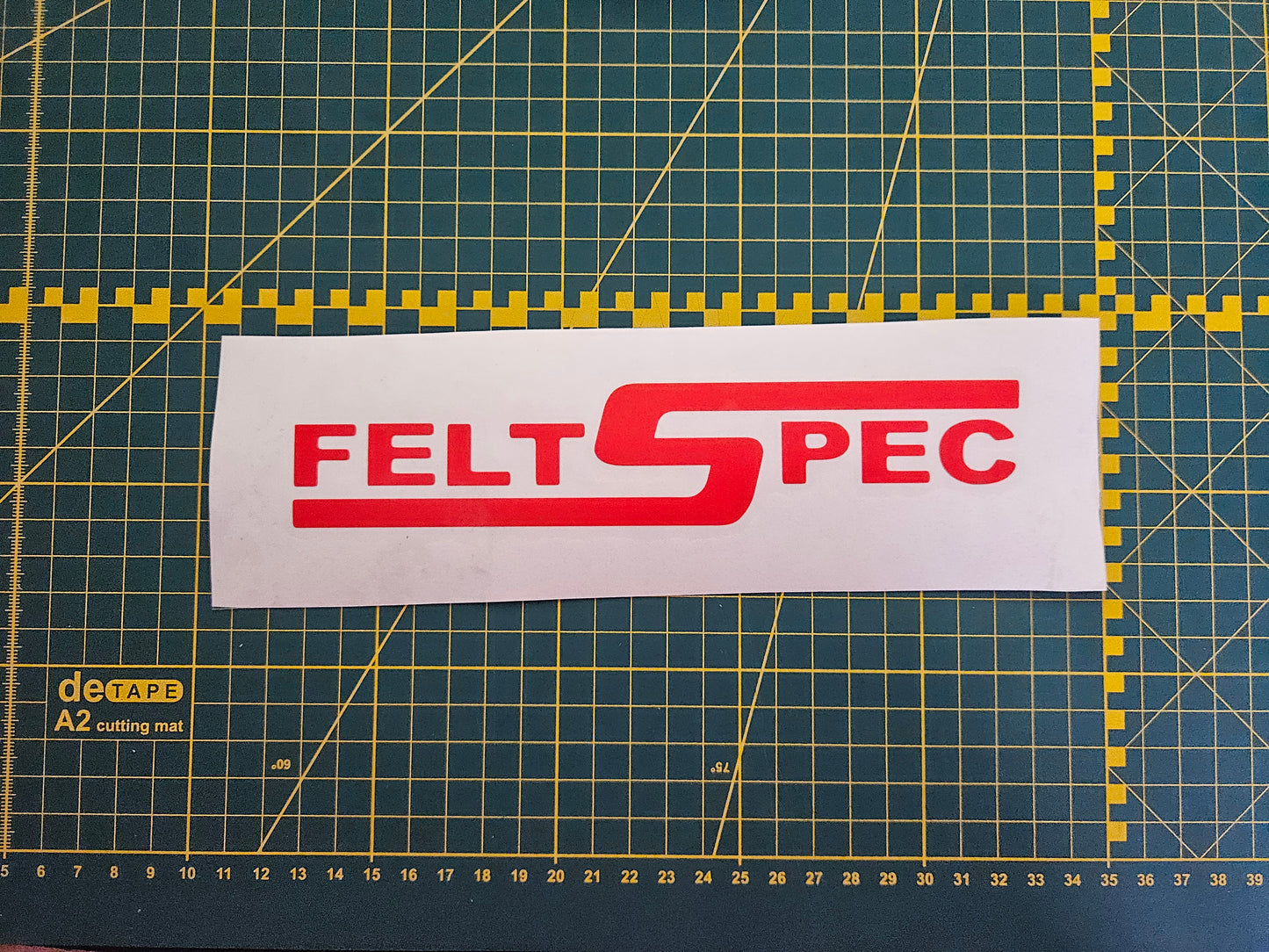 felt spec sticker